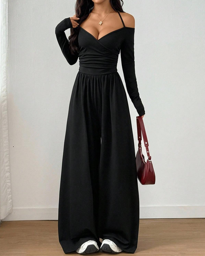 Mono de punto, de manga larga con cuello halter y pierna ancha