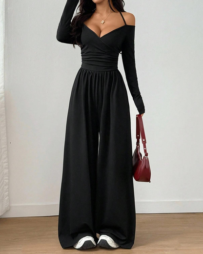 Mono de punto, de manga larga con cuello halter y pierna ancha