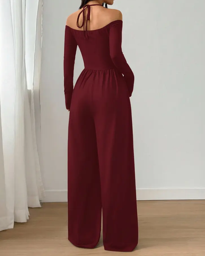 Mono de punto, de manga larga con cuello halter y pierna ancha