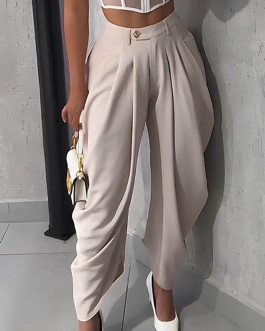 Pantalón casual de tiro alto holgado con plisado y bajo irregular