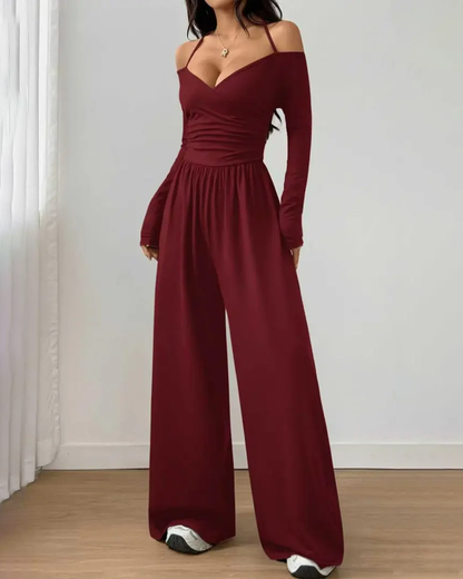Mono de punto, de manga larga con cuello halter y pierna ancha