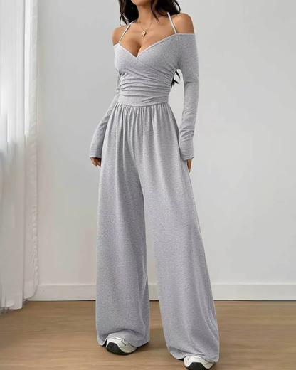 Mono de punto, de manga larga con cuello halter y pierna ancha
