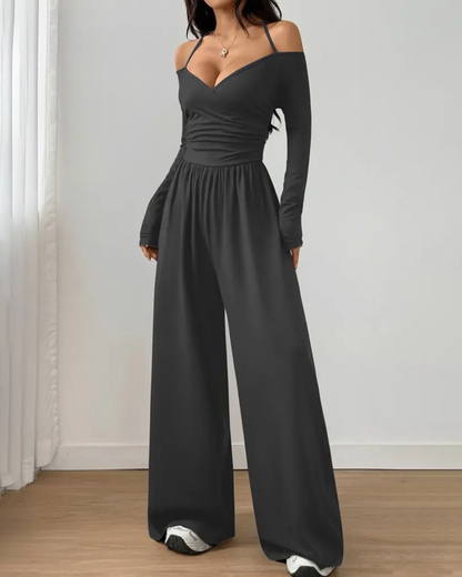 Mono de punto, de manga larga con cuello halter y pierna ancha