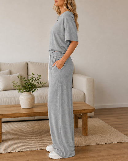 Conjunto casual de top con hombros descubiertos y pantalón acampanado