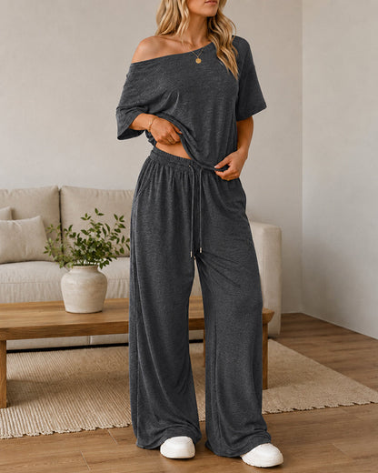 Conjunto casual de top con hombros descubiertos y pantalón acampanado
