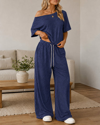 Conjunto casual de top con hombros descubiertos y pantalón acampanado