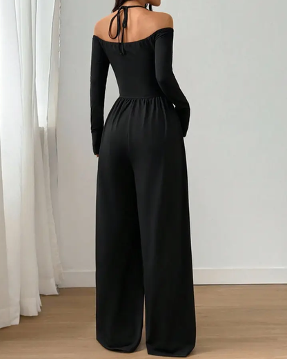 Mono de punto, de manga larga con cuello halter y pierna ancha